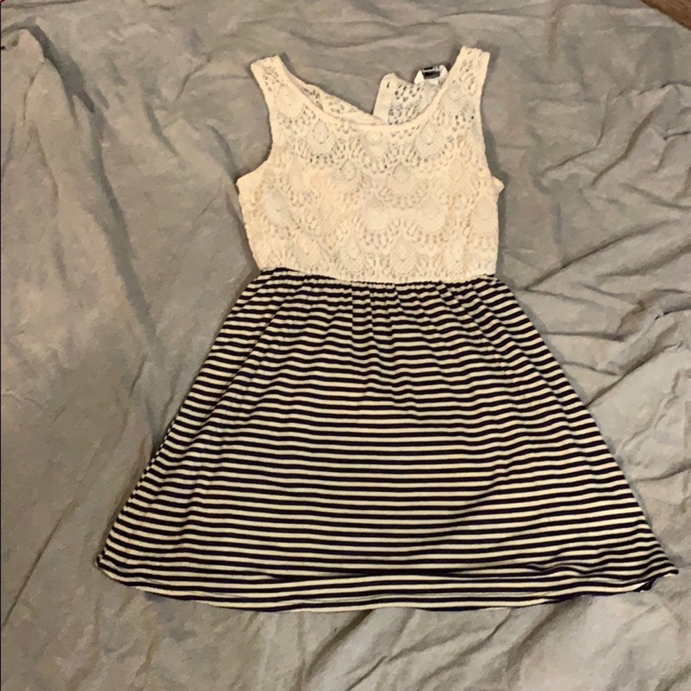 White top and pattern bottom dress Peak a boo back